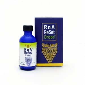 Dr Carolyn Dean's RnA ReSet Drops™ in a bottle next to packaging on a white background